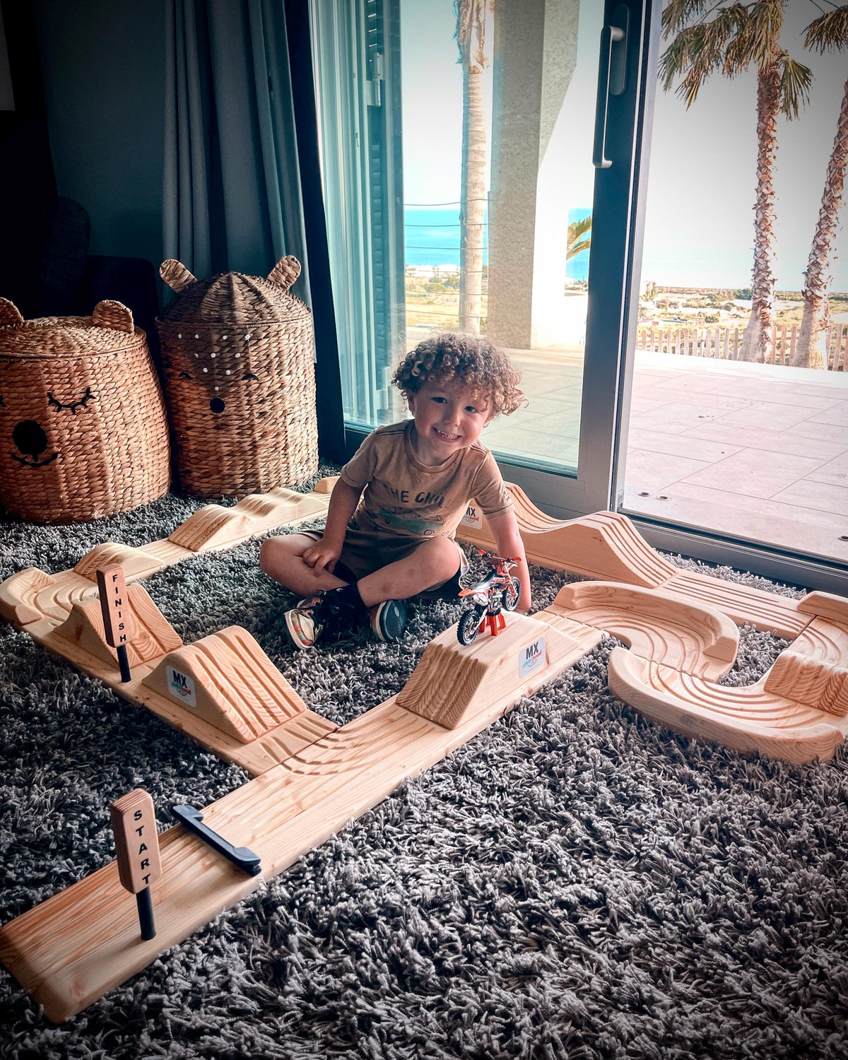 Unique handcrafted wooden motocross track perfect for kids who love dirt bikes.