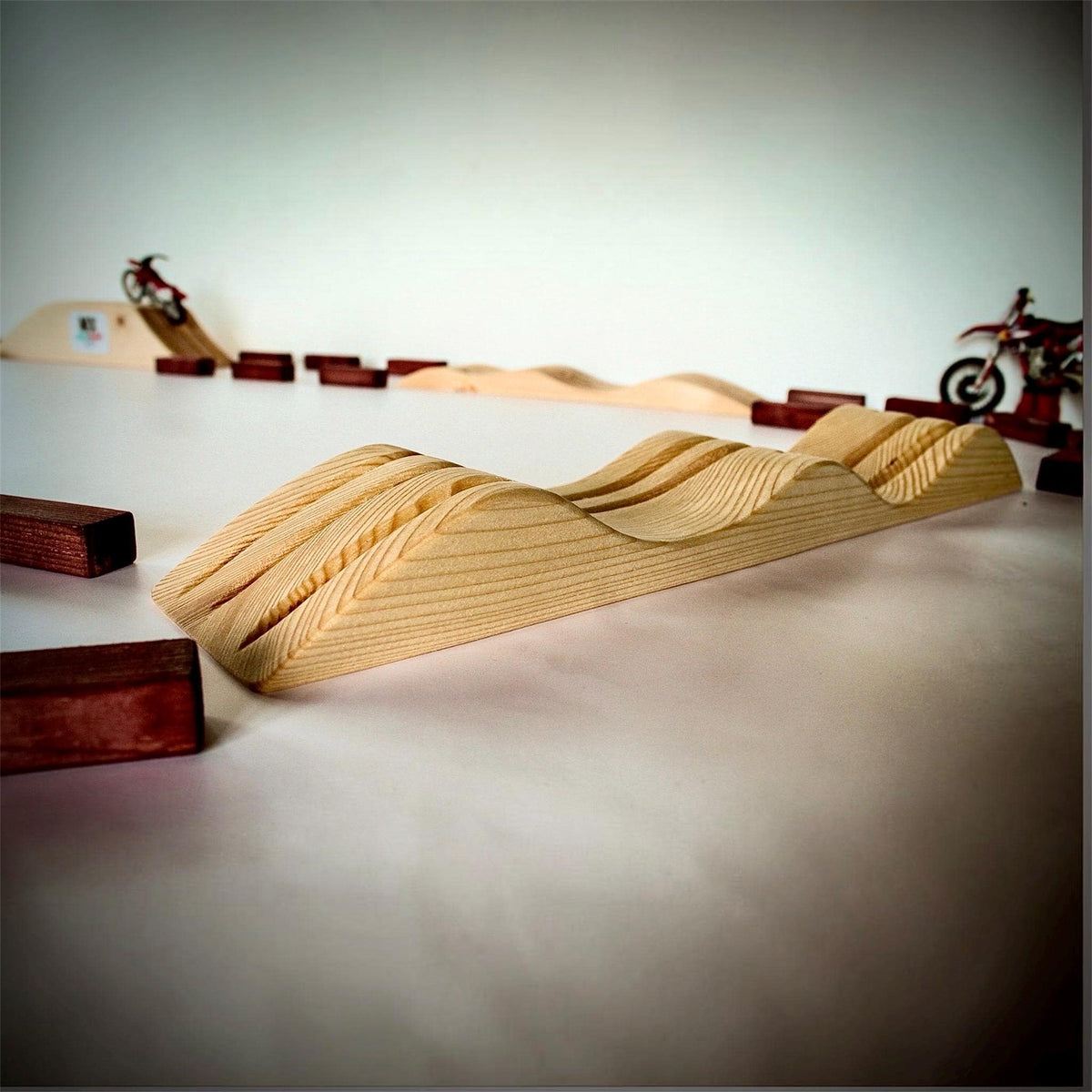 Wooden motocross playset with jumps