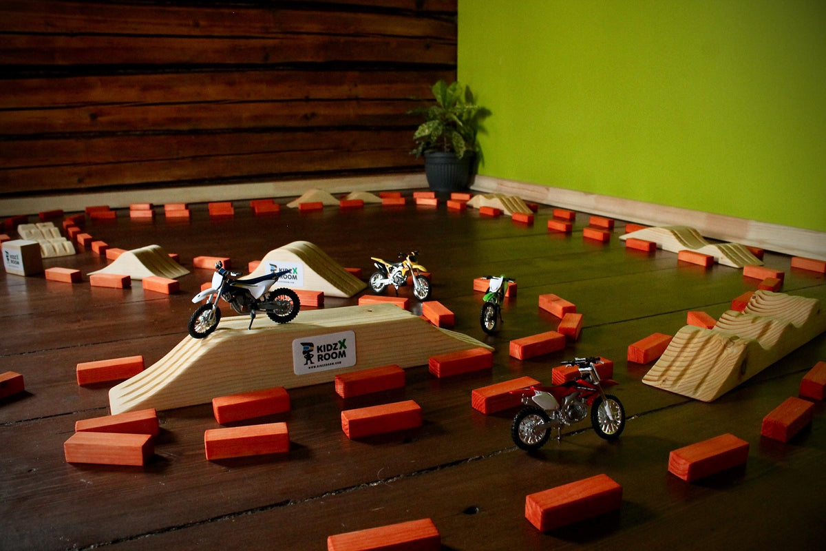 Kids motorcycle racing track with jumps
