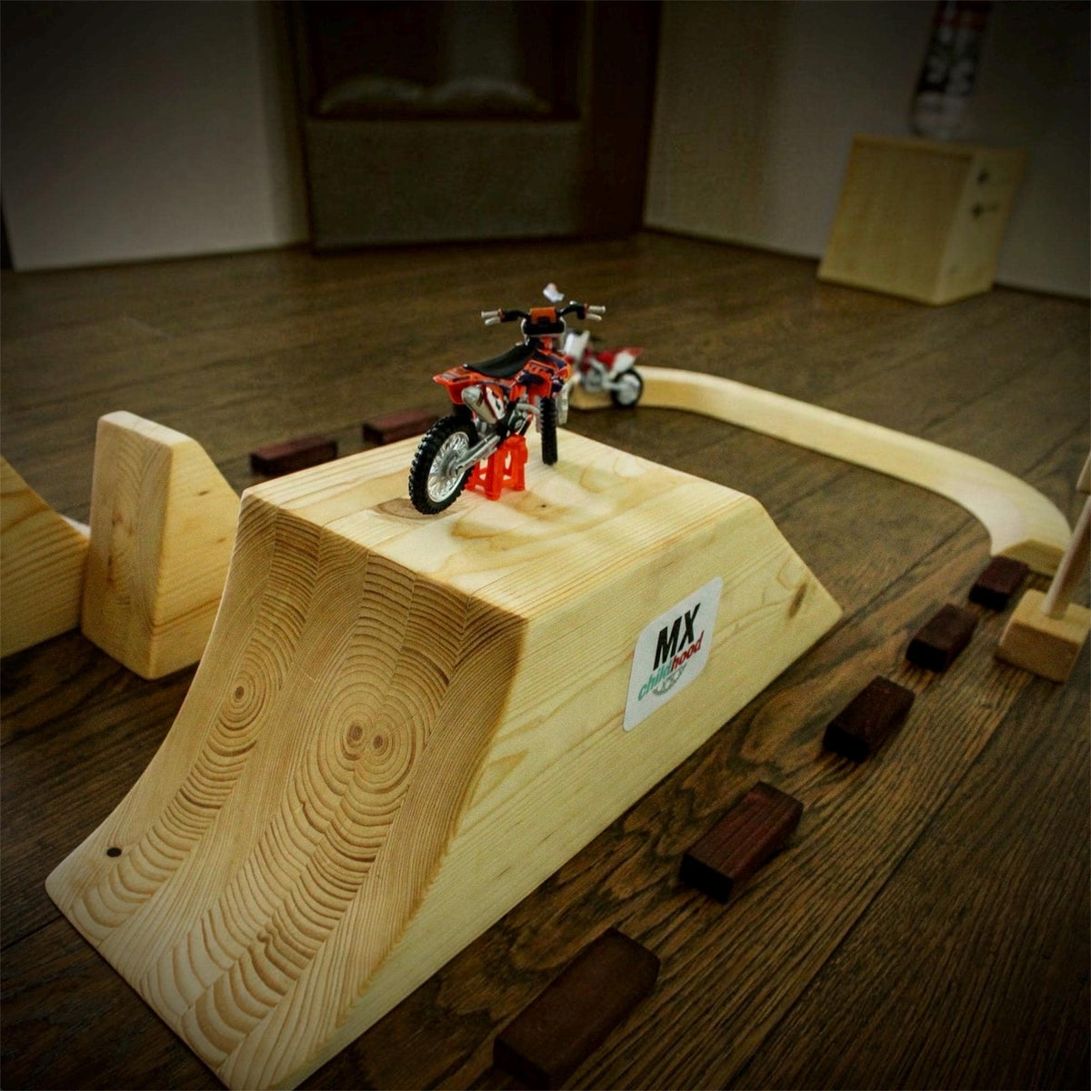 FMX dirt bike jump set designed for children who love motofreestyle riding and aerial tricks.